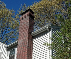 what does a chimney cap do