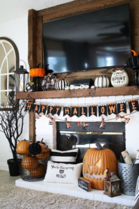 fireplace with halloween decorations