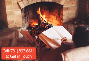 cozy fireplace reading in pajamas