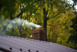 chimney with smoke coming out of top